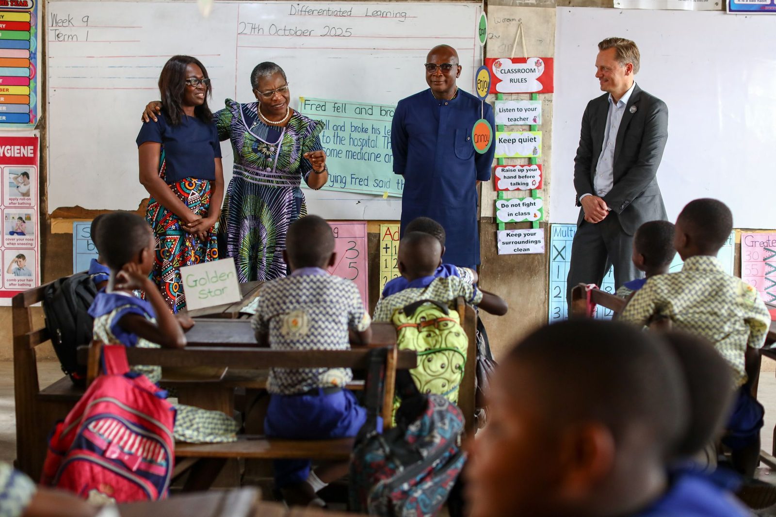 Dr Obiageli “Oby” Ezekwesili with a teacher and partners in a primary classroom during a school visit